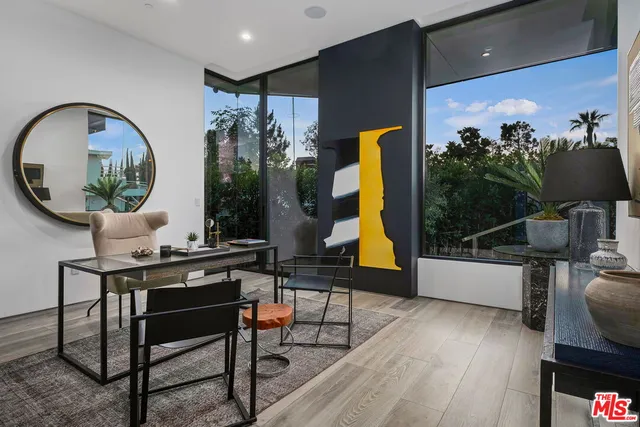 a kitchen with stainless steel appliances granite countertop a sink and stove