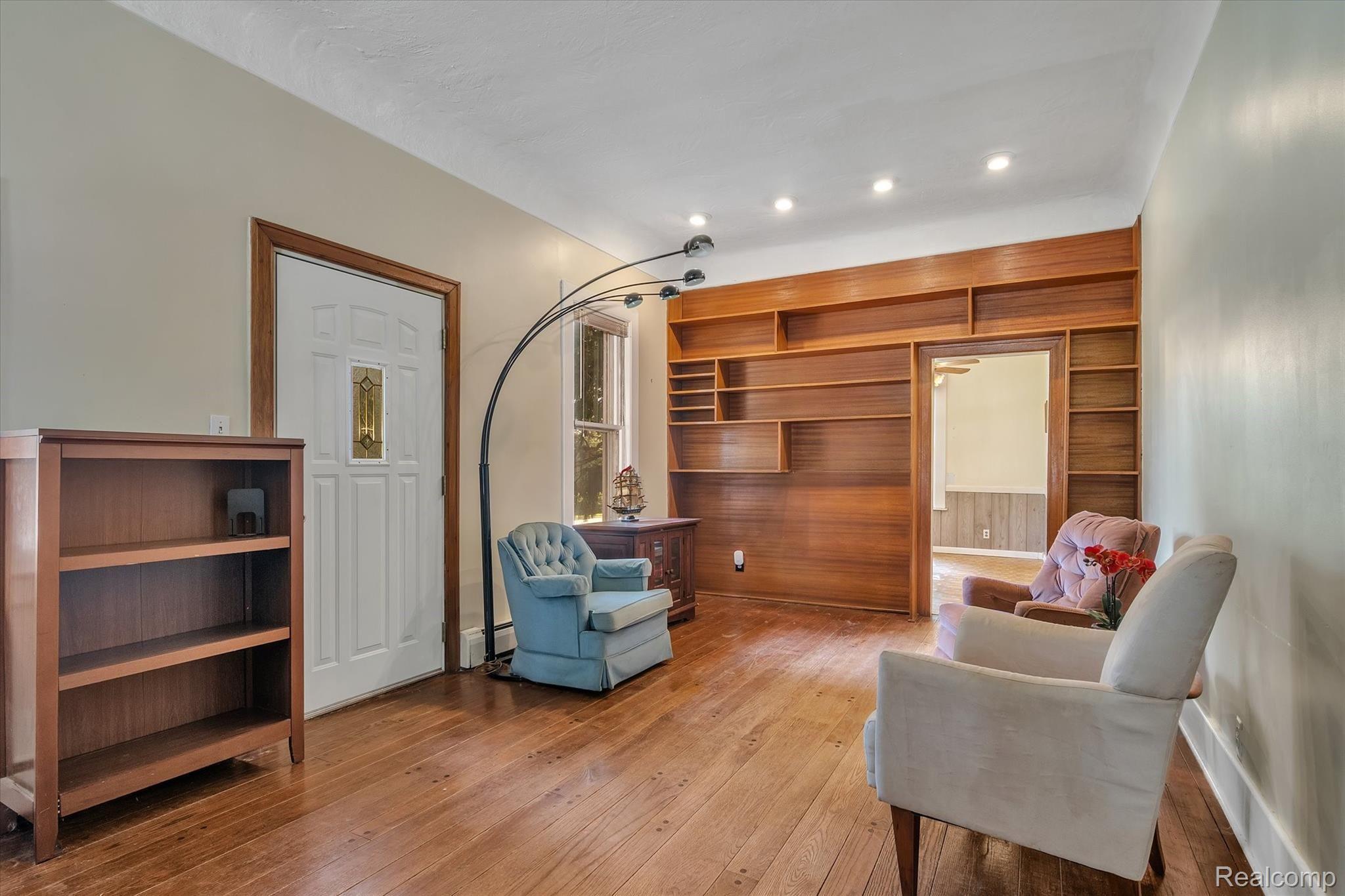 25010 Graham Road Redford, MI 48239 - Photo 6 of 27 Large living and sitting area with lots of natural light and built in storage.