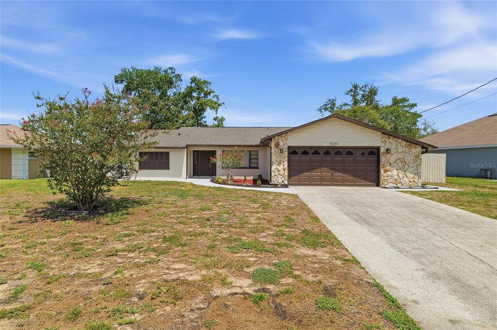 2433 Waterfall Drive Spring Hill, FL 34608 - Photo 2 of 42