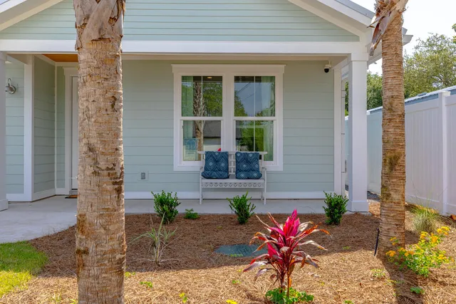 a flower in front of a house