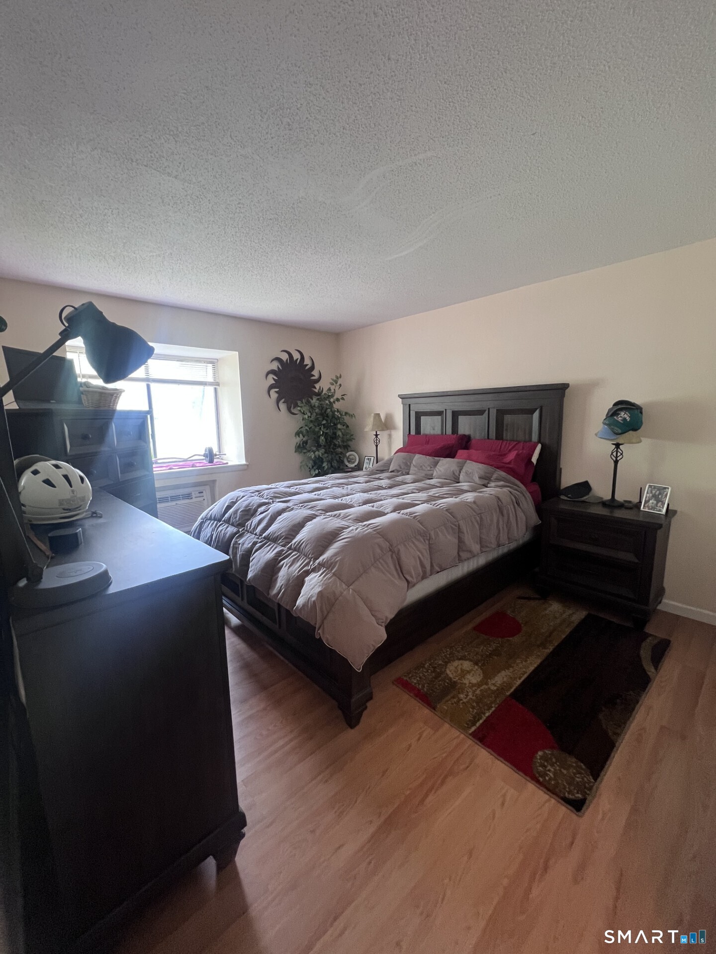 93 Kent Court, Unit 93 Meriden, CT 06450 - Photo 18 of 27 a bedroom with a bed and window
