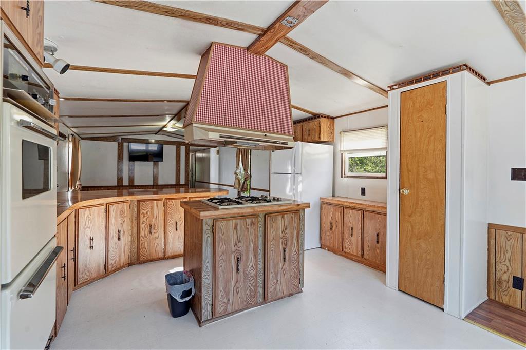 1300 Hidden Valley Road Bulger, PA 15019 - Photo 15 of 25 a kitchen with cabinets and stainless steel appliances