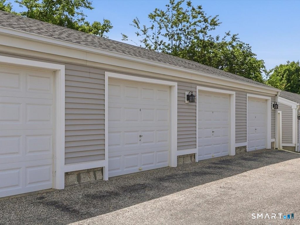 175 South End Road, Unit B13 East Haven, CT 06512 - Photo 37 of 40 One car detached garage with electronic door opener