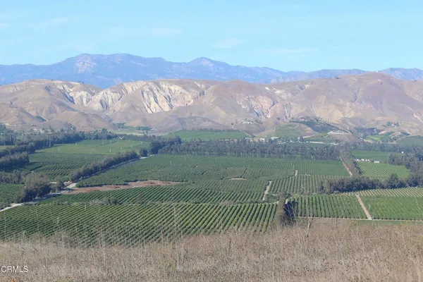 a view of mountain view with mountains in the background