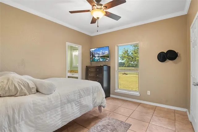 a bedroom with a bed and walk in closet