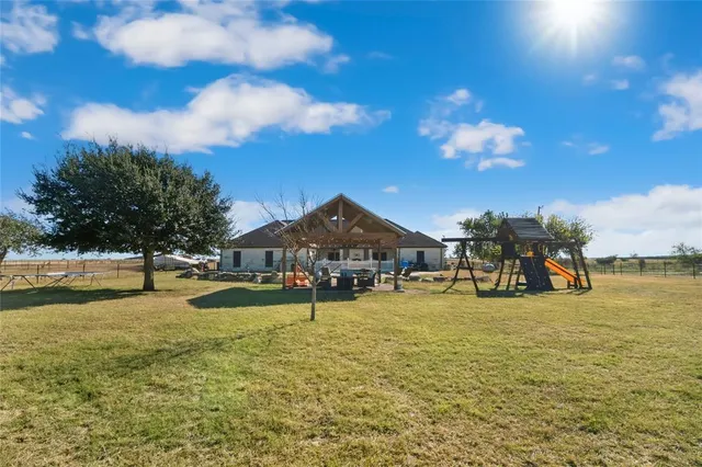 a view of a terrace with sitting area