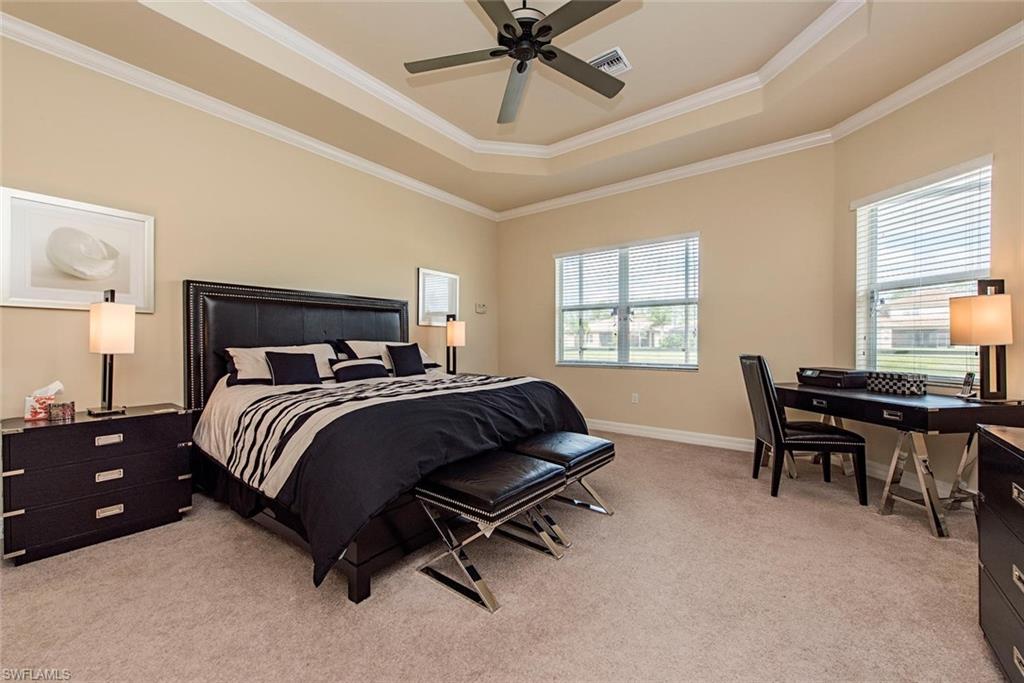 6559 Monterey Point Naples, FL 34105 - Photo 7 of 12 a bedroom with a bed and a window