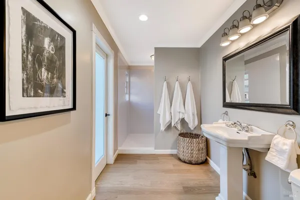 a bathroom with a sink and a mirror