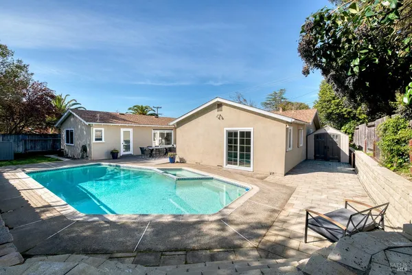 a view of outdoor space deck and swimming pool