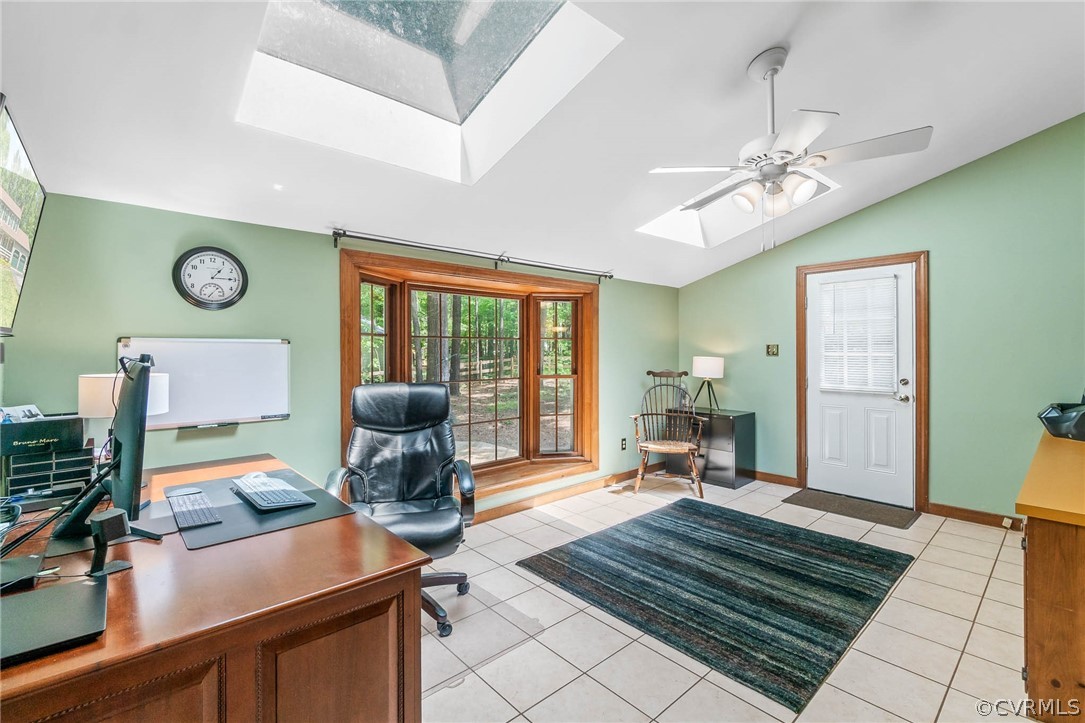 2801 Fairgate Road Midlothian, VA 23112 - Photo 16 of 49 a living room with furniture a clock on wall and a large window