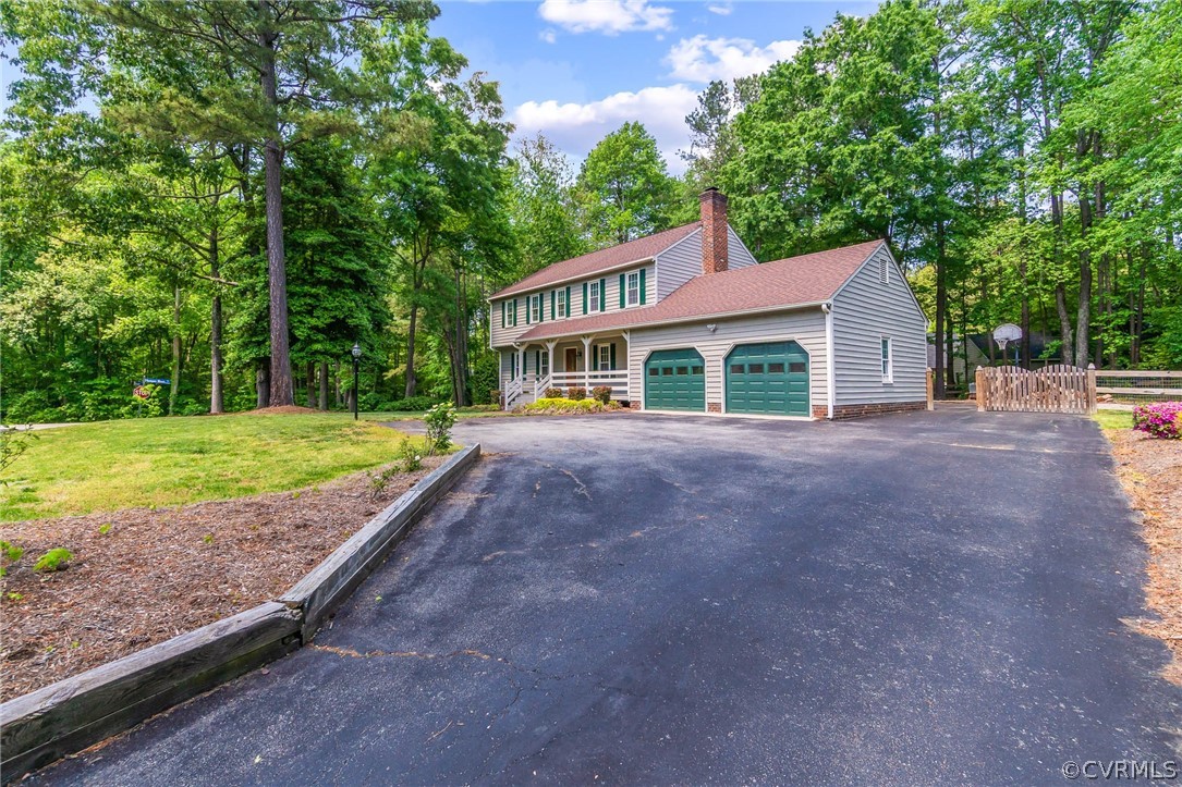 2801 Fairgate Road Midlothian, VA 23112 - Photo 2 of 49 a view of a house with a yard