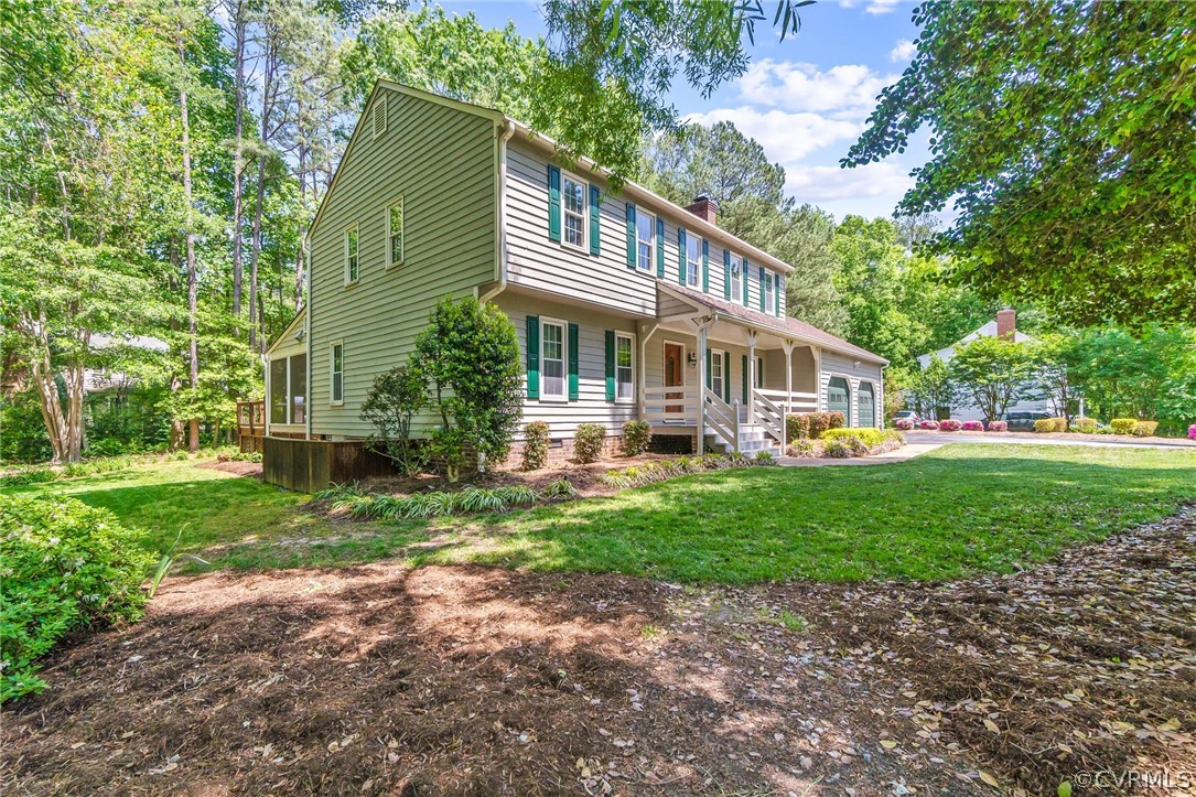 2801 Fairgate Road Midlothian, VA 23112 - Photo 3 of 49 a front view of a house with a yard and green space