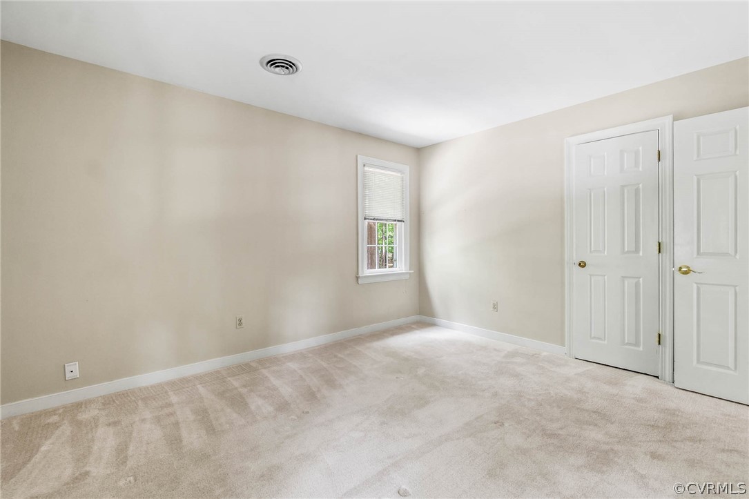 2801 Fairgate Road Midlothian, VA 23112 - Photo 38 of 49 a view of an empty room with a window