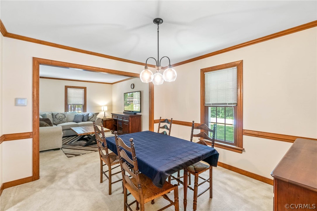 2801 Fairgate Road Midlothian, VA 23112 - Photo 8 of 49 a view of a dining room with furniture window and wooden floor