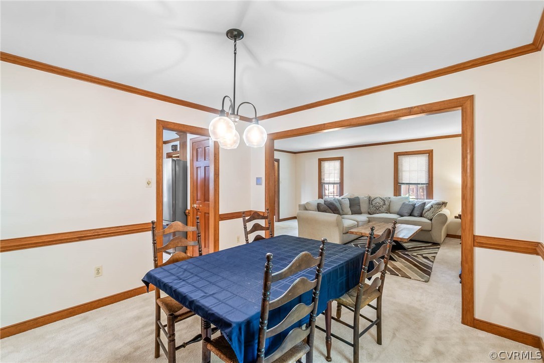 2801 Fairgate Road Midlothian, VA 23112 - Photo 10 of 49 a view of a dining room with furniture window and wooden floor