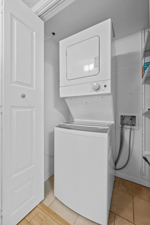 3204 Menchaca Road, Unit 405 Austin, TX 78704 - Photo 13 of 29 a utility room with a washer and dryer