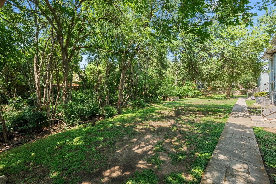 3204 Menchaca Road, Unit 405 Austin, TX 78704 - Photo 18 of 29 a view of a street with a yard