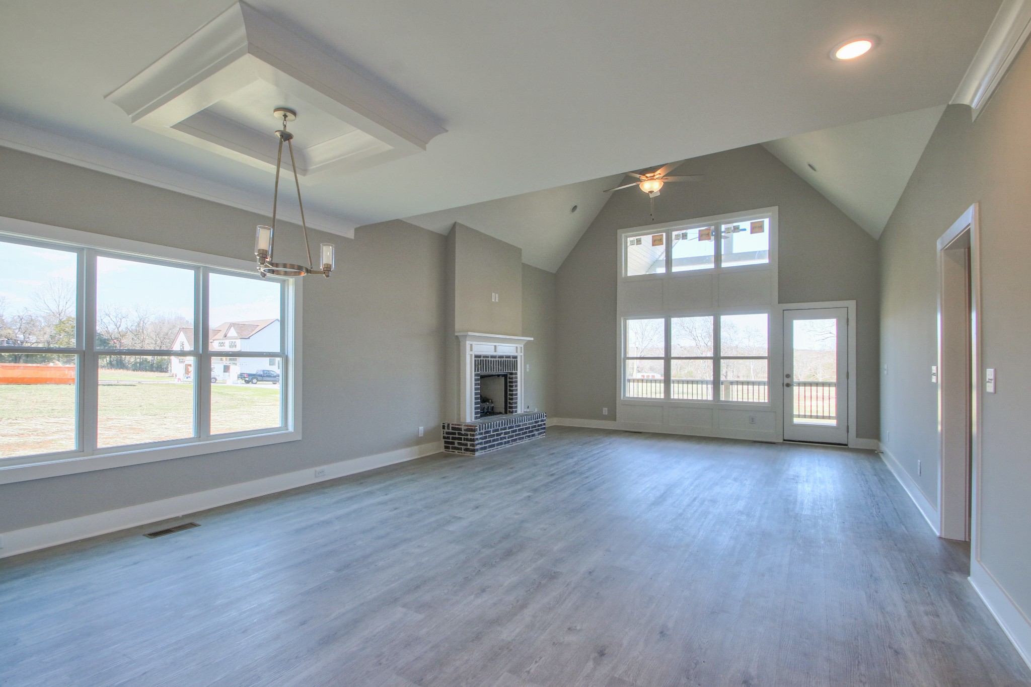 2595 Tracy Road Watertown, TN 37184 - Photo 28 of 45 a view of an empty room with wooden floor and a window