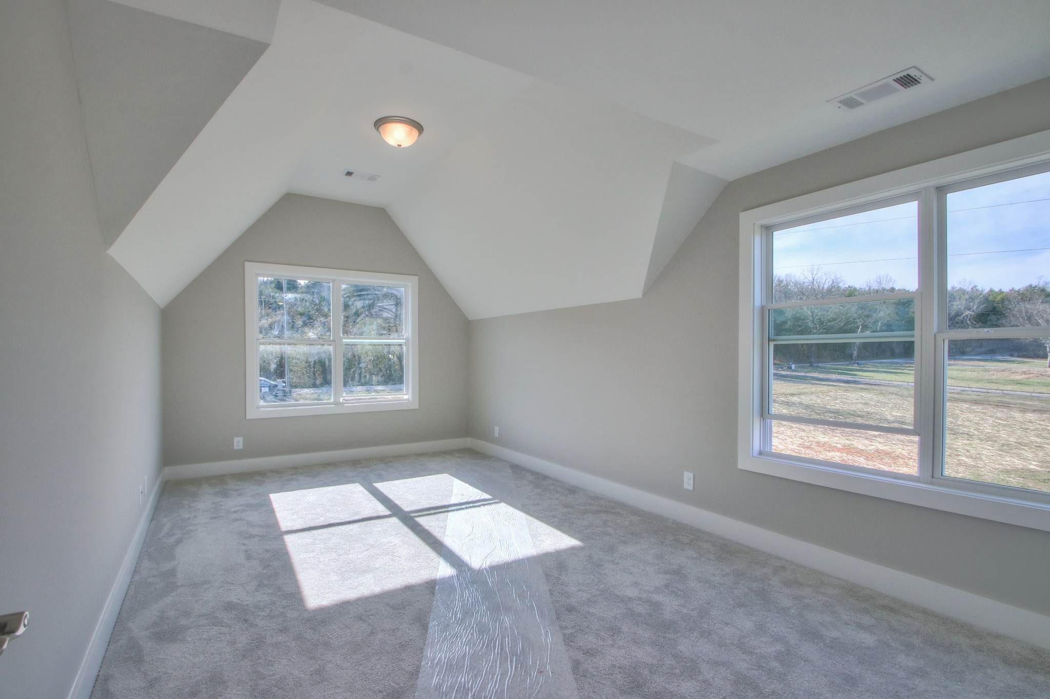 2595 Tracy Road Watertown, TN 37184 - Photo 38 of 45 an empty room with windows