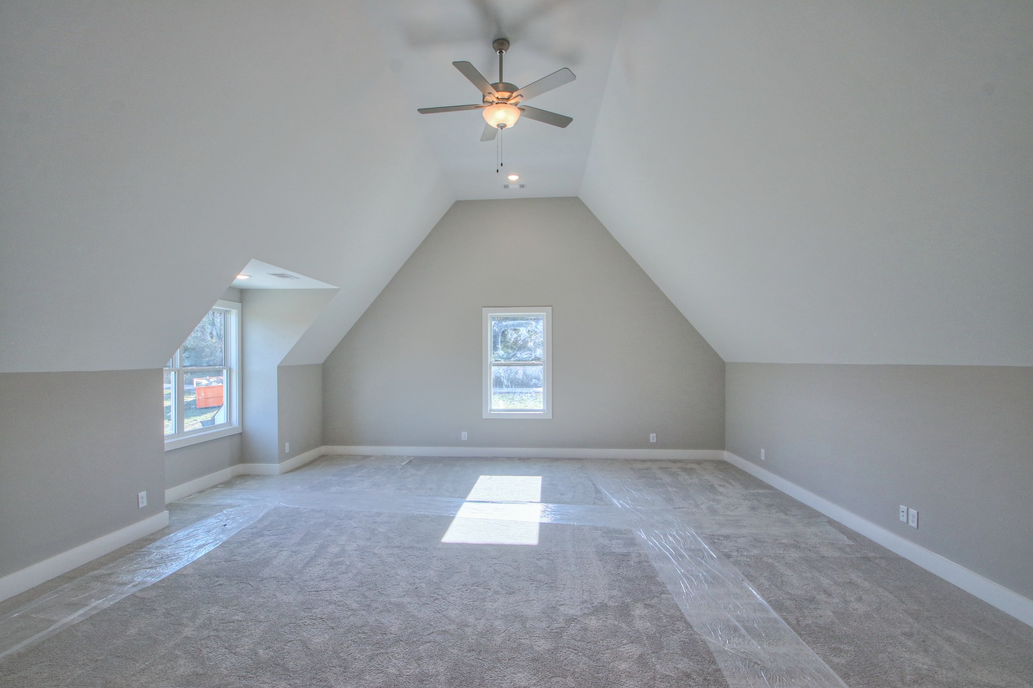 2595 Tracy Road Watertown, TN 37184 - Photo 44 of 45 an empty room with windows and fan