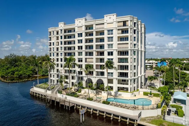a view of a building with outdoor seating