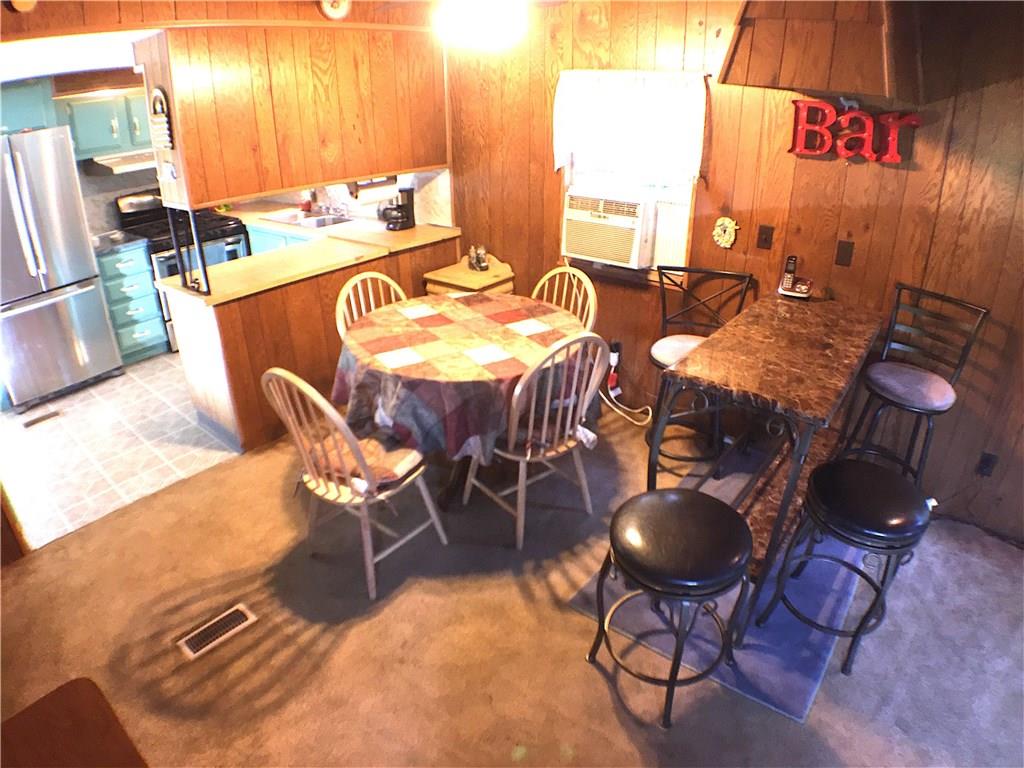 149 Fry Hollow Road Hunker, PA 15639 - Photo 13 of 22 Bar Counter height table area for extra seating.