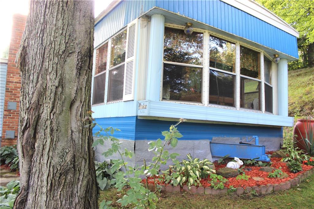 This roomy home features 2 Bay windows at each end of the home, a front porch/mud room addition, OPEN FLOOR PLAN CONCEPT, 3 beds, 1.5 baths and the Laundry Center.