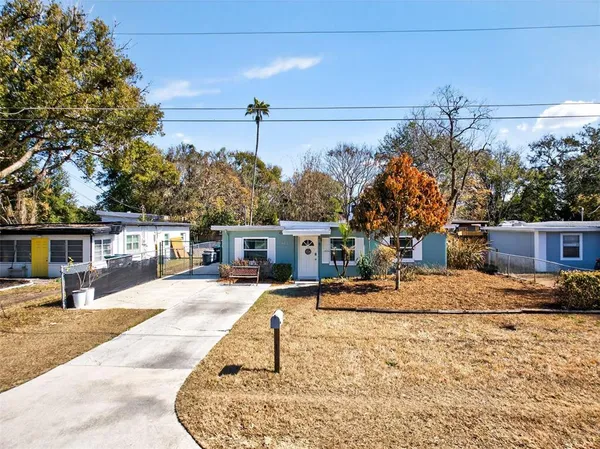 a house with yard in front of it