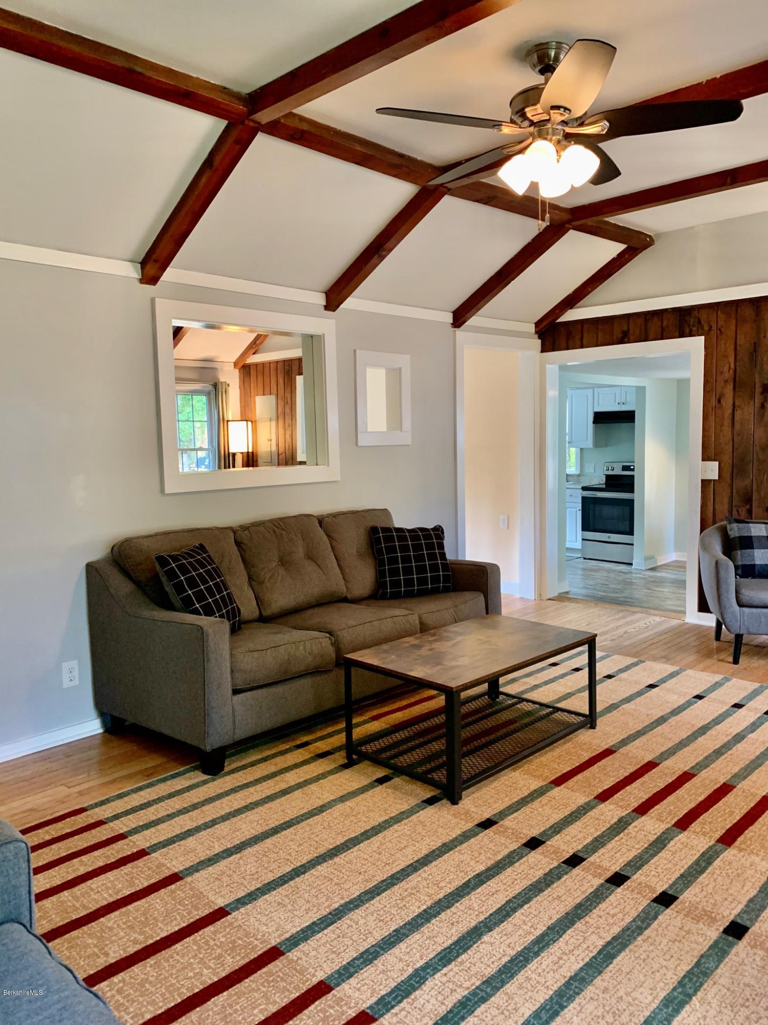 250 Wells Road Becket, MA 01223 - Photo 14 of 34 Livingroom toward den & dining/kitchen