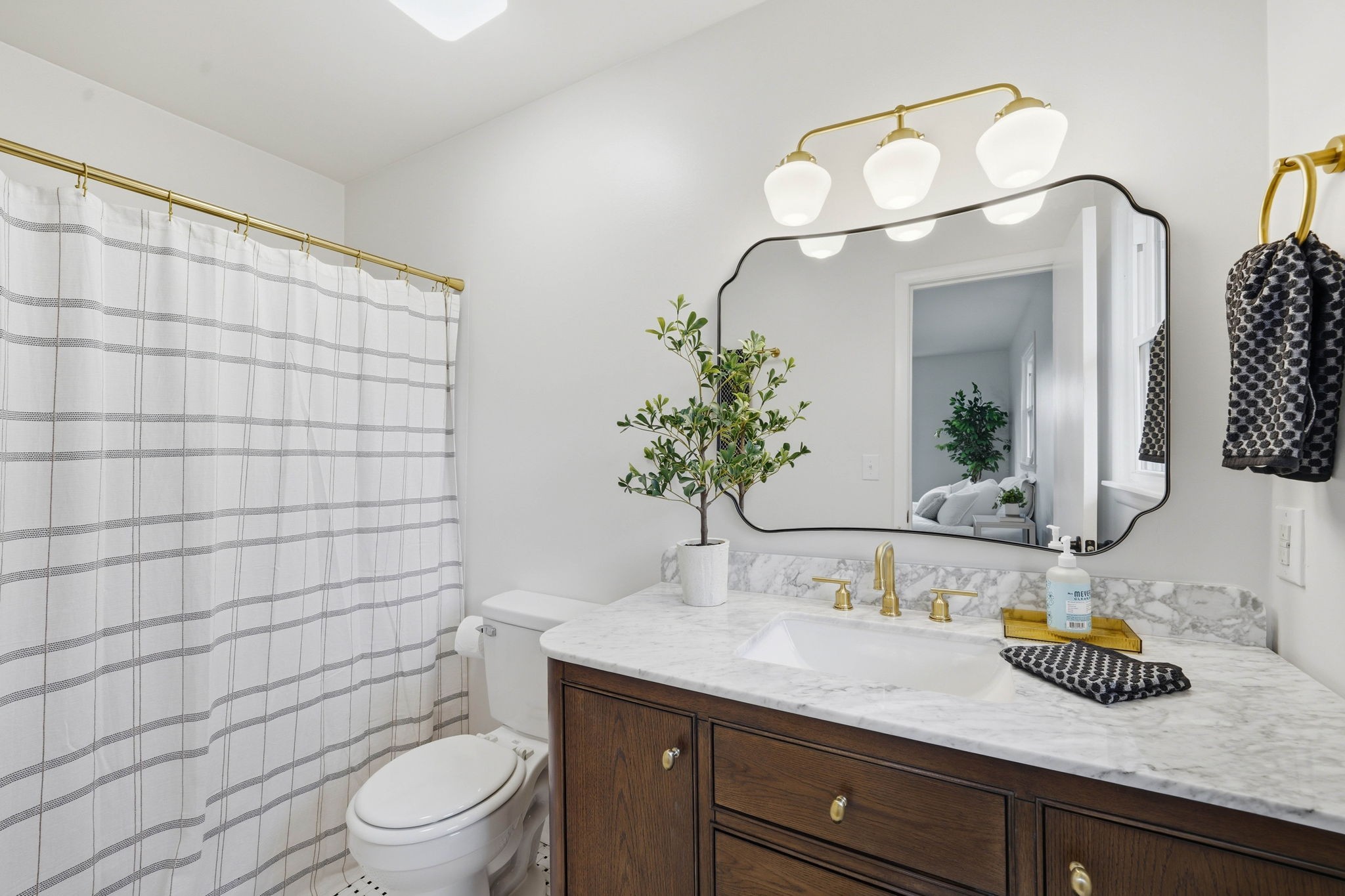 166 Bains Road Hillsboro, TN 37342 - Photo 12 of 37 a bathroom with a granite countertop sink a toilet and a mirror