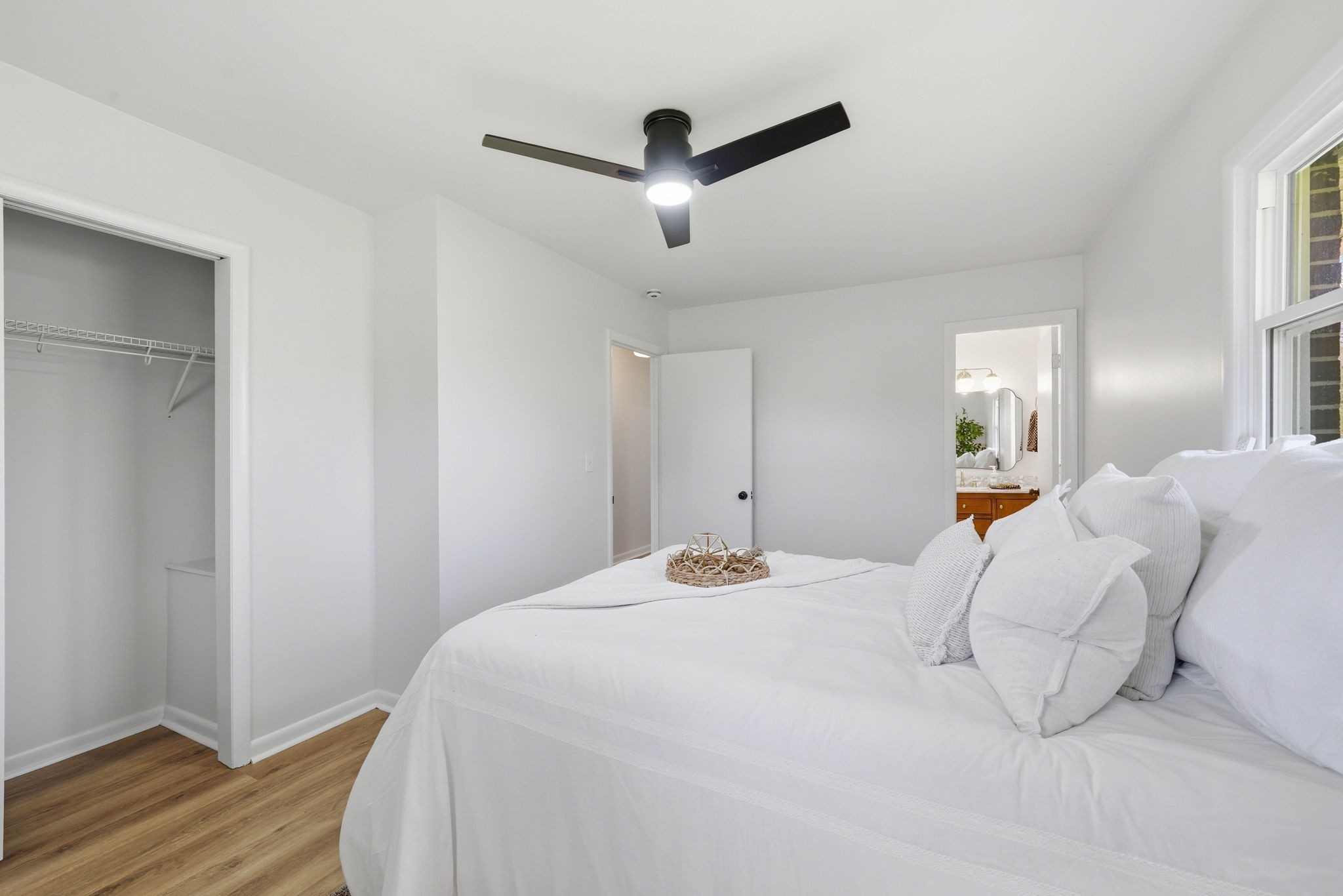 166 Bains Road Hillsboro, TN 37342 - Photo 14 of 37 a bedroom with a bed and wooden floor