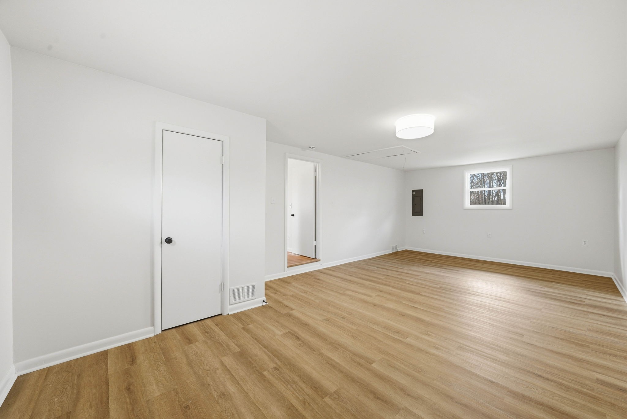 166 Bains Road Hillsboro, TN 37342 - Photo 16 of 37 a view of an empty room with wooden floor and a window