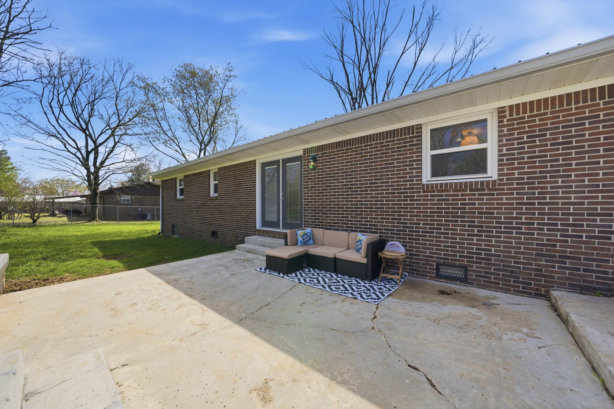 166 Bains Road Hillsboro, TN 37342 - Photo 26 of 37 a brick house with garden in front of it