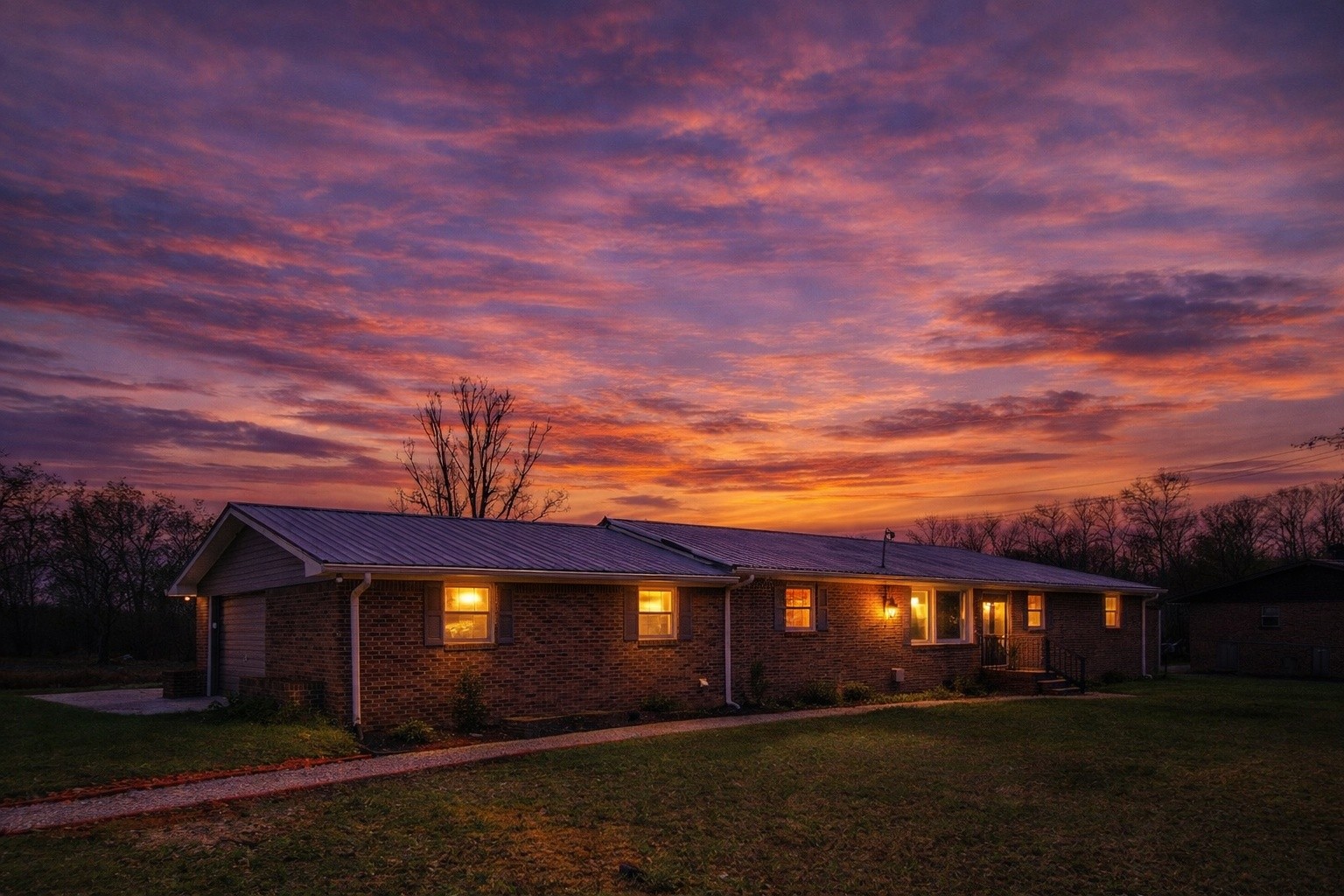 166 Bains Road Hillsboro, TN 37342 - Photo 3 of 37 a front view of a house with a yard and a yard