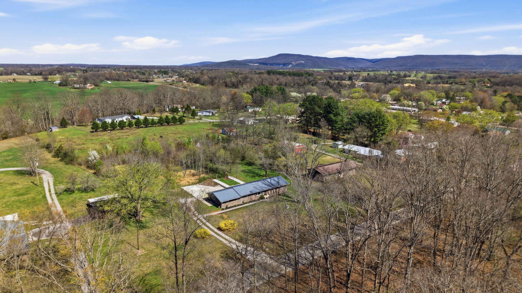 166 Bains Road Hillsboro, TN 37342 - Photo 32 of 37 a view of a city with mountains in the background