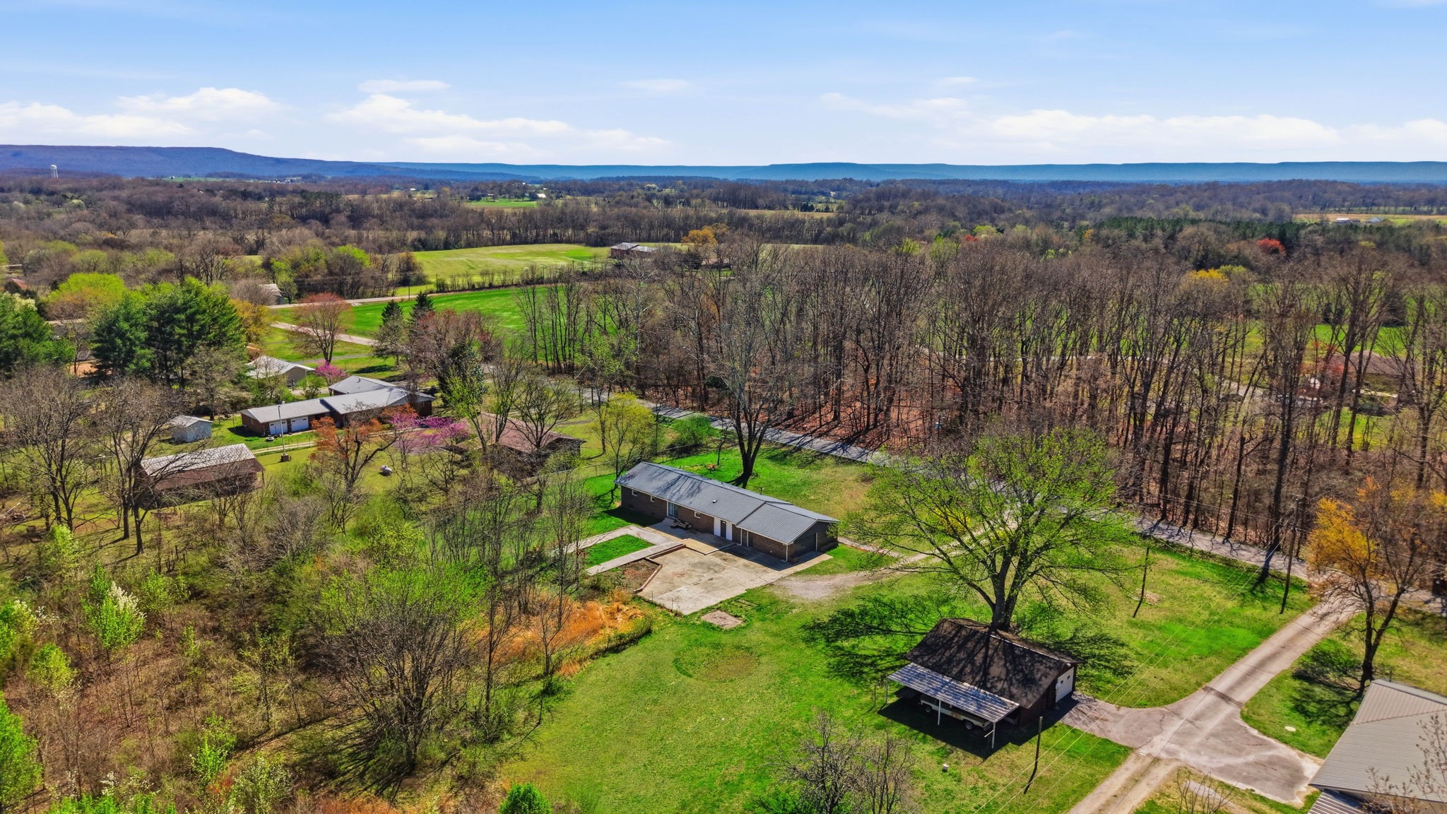 166 Bains Road Hillsboro, TN 37342 - Photo 34 of 37 a view of a lake with a mountain in the background