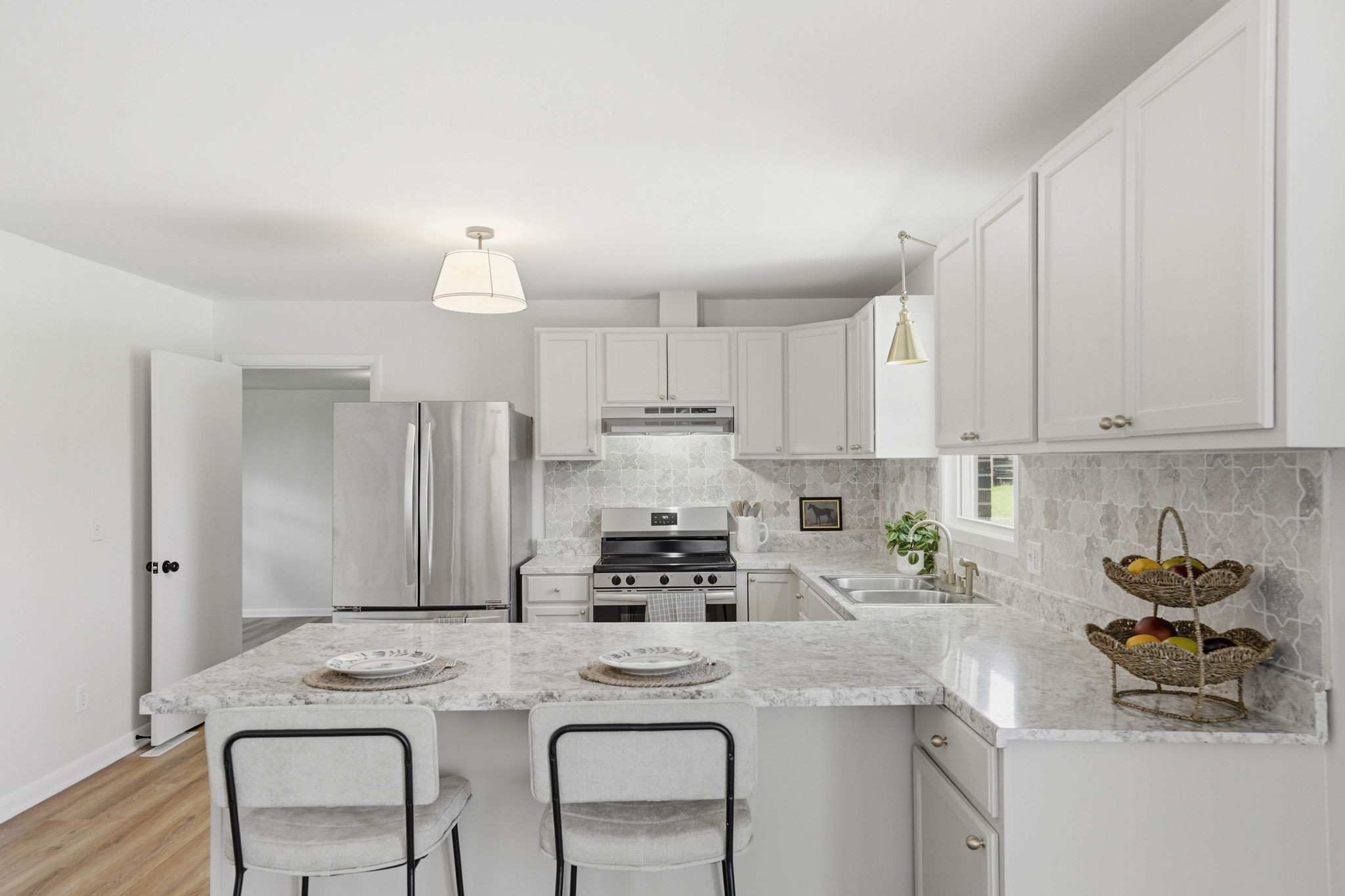 166 Bains Road Hillsboro, TN 37342 - Photo 9 of 37 a kitchen with stainless steel appliances granite countertop a sink and cabinets