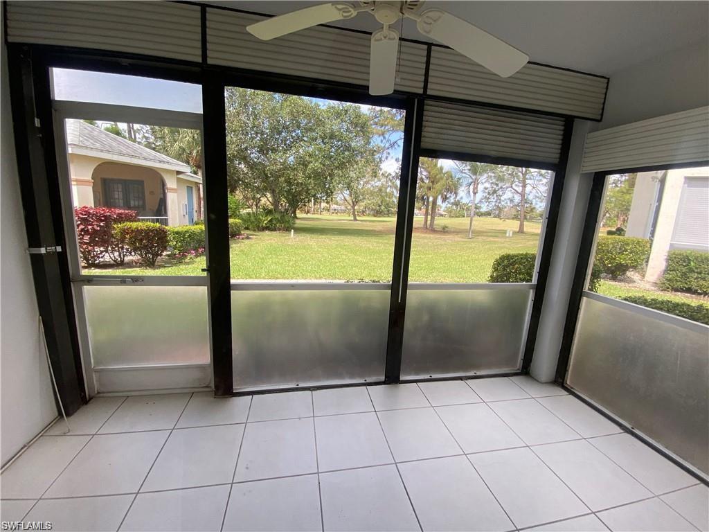 705 Augusta Boulevard, Unit 7055 Naples, FL 34113 - Photo 14 of 18 a view of empty room with window