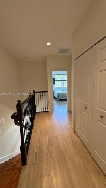 7844 Northwest 114th Path, Unit 7844 Doral, FL 33178 - Photo 16 of 18 a view of a hallway with wooden floor
