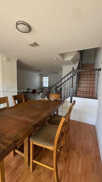 7844 Northwest 114th Path, Unit 7844 Doral, FL 33178 - Photo 7 of 18 a dining room with furniture and a rug
