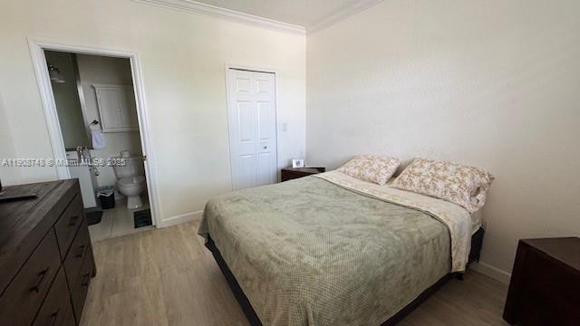 7844 Northwest 114th Path, Unit 7844 Doral, FL 33178 - Photo 9 of 18 a bedroom with a bed and a mirror