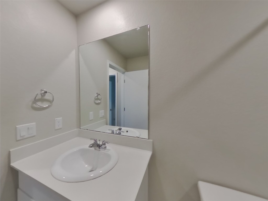 3540 Catlett Crk Road Georgetown, TX 78626 - Photo 10 of 26 a bathroom with a sink and a mirror