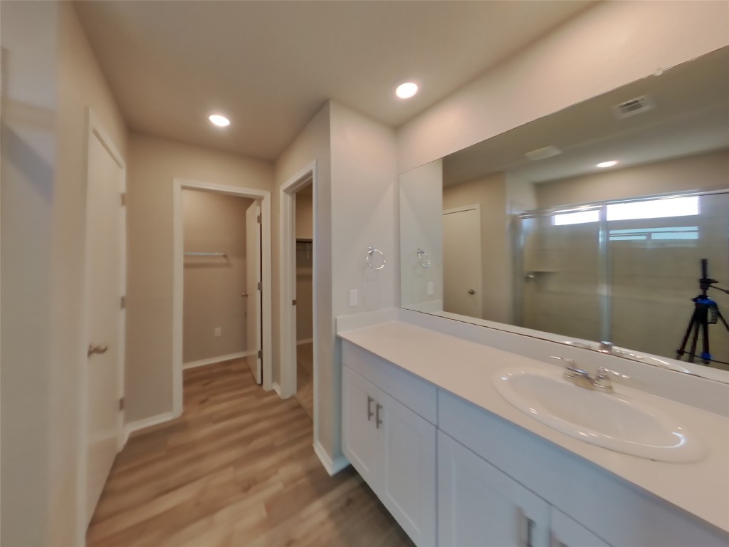 3540 Catlett Crk Road Georgetown, TX 78626 - Photo 6 of 26 a bathroom with a double vanity sink mirror and shower