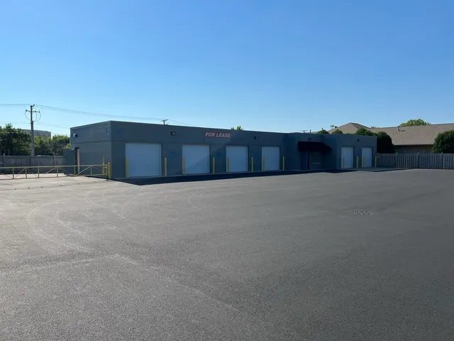 a view of a house with a street