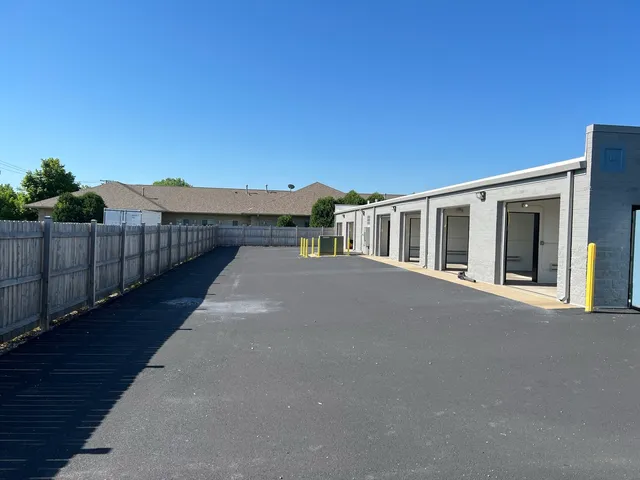 a front view of a house with a garage