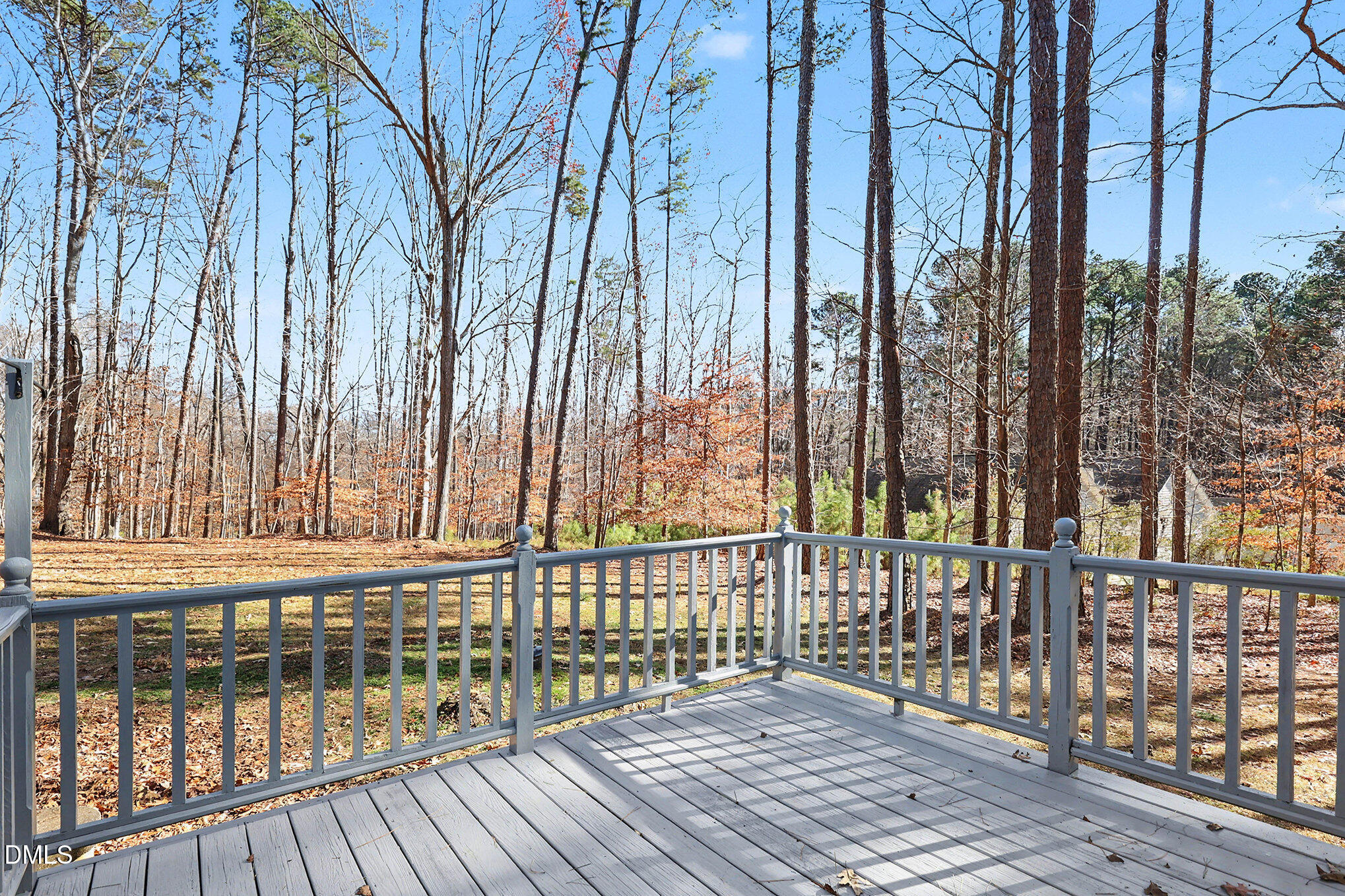 4604 Bartwood Drive Raleigh, NC 27613 - Photo 26 of 38 a view of a wooden balcony with outdoor space