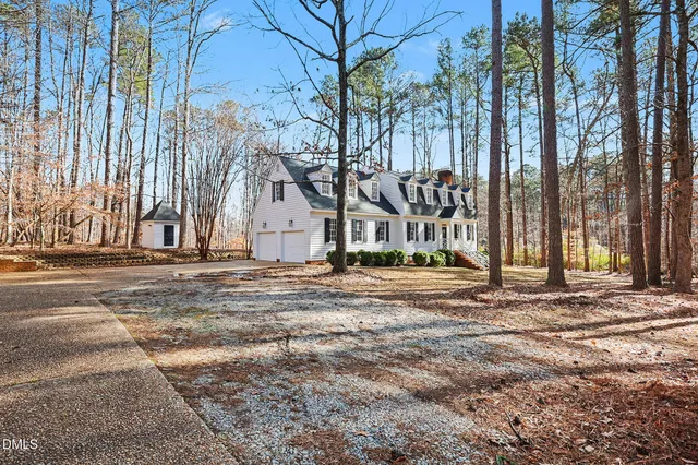 a view of a house with a snow on the ground