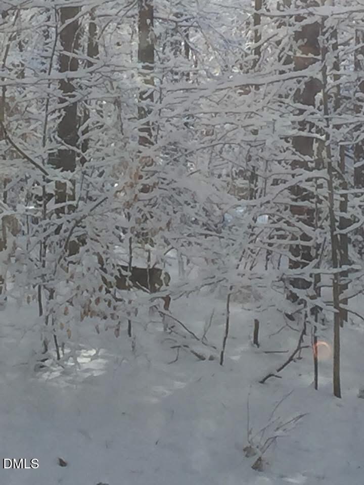 4604 Bartwood Drive Raleigh, NC 27613 - Photo 34 of 38 a view of a row of construction space