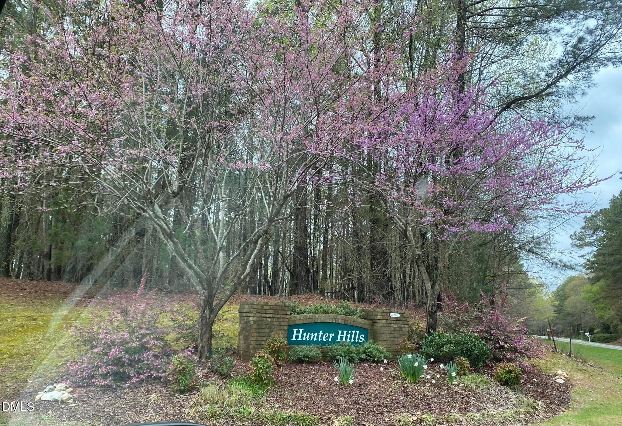 4604 Bartwood Drive Raleigh, NC 27613 - Photo 35 of 38 a view of a park that has large trees