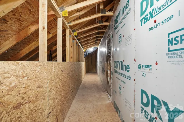 a view of a room with racks on the wall